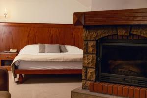 Postel nebo postele na pokoji v ubytování Merab Hotel