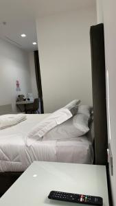 Postel nebo postele na pokoji v ubytování AngelicaHome Roma
