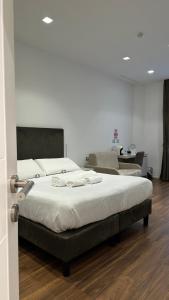 Postel nebo postele na pokoji v ubytování AngelicaHome Roma