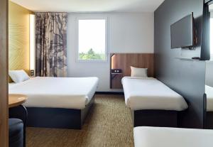 Postel nebo postele na pokoji v ubytování B&B HOTEL Paris Créteil