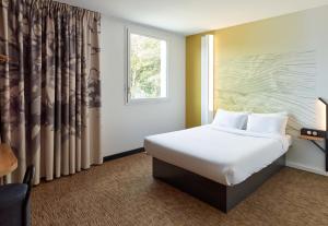 Postel nebo postele na pokoji v ubytování B&B HOTEL Paris Créteil