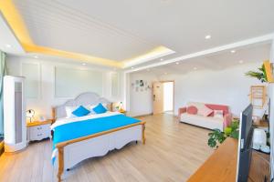 Dali Listening Seaview Villa大理听城海景别墅客房内的一张或多张床位