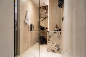 Ein Badezimmer in der Unterkunft Luxury Rooms - FOR GIFT