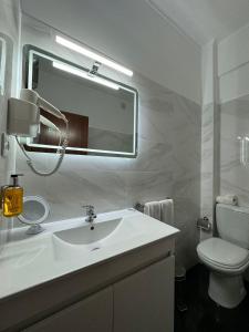 Koupelna v ubytování Hotel Onix