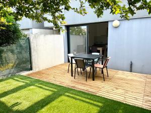 Κήπος έξω από το Appartement calme avec exterieur +2 φωτογραφίες