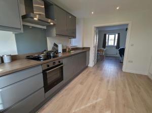 Η κουζίνα ή μικρή κουζίνα στο Newly Built Thetford Retreat