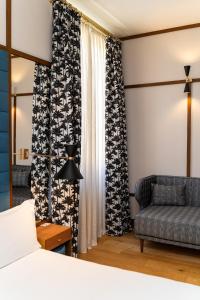 Cama ou camas em um quarto em Room Mate Luca, Florence