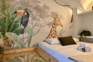 Postel nebo postele na pokoji v ubytování The Jungle - Superbe appartement au coeur de Lyon !