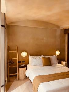 a bedroom with a large bed and a brown wall at Jiufen 35 in Jiufen