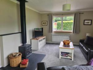 Χώρος καθιστικού στο Inveruglas Farm Cottage