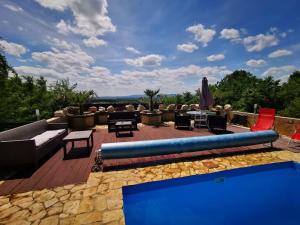 a view of a patio with a swimming pool at Villa Somlyó in Fót