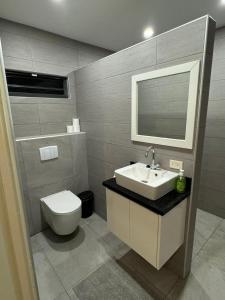 Koupelna v ubytování MGM Apartments Paramaribo