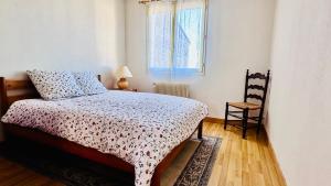 Ένα ή περισσότερα κρεβάτια σε δωμάτιο στο Villa Camélia YourHostHelper