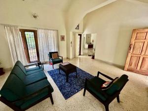 Posezení v ubytování Mango Tree Villa
