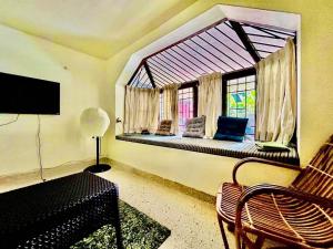 Posezení v ubytování Mango Tree Villa