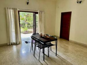 Posezení v ubytování Mango Tree Villa