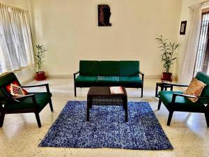 Posezení v ubytování Mango Tree Villa