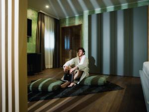 TV a/nebo společenská místnost v ubytování Roccaverde Hotel