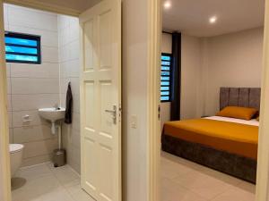 Koupelna v ubytování MGM Apartments Paramaribo + 27 fotografií