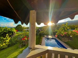 Fotografie z fotogalerie ubytování Finca Cabaña con piscina cerca al Lago Calima v destinaci Calima