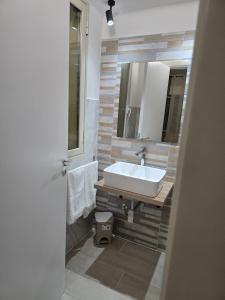 Salle de bains dans l'établissement Vento di Mare