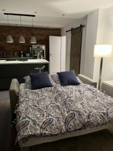 Ένα ή περισσότερα κρεβάτια σε δωμάτιο στο CityLoft Andernach