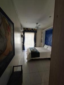 Łóżko lub łóżka w pokoju w obiekcie Hostal Villamañez