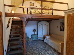 Postel nebo postele na pokoji v ubytování casa vacanze Filomena