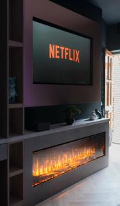 TV a/nebo společenská místnost v ubytování Secret Suites