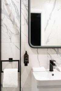 Koupelna v ubytování Secret Suites