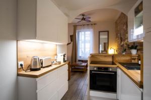 Kuchnia lub aneks kuchenny w obiekcie Appartement très cosy avec cour