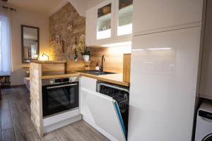 Kuchnia lub aneks kuchenny w obiekcie Appartement très cosy avec cour