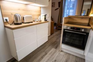 Kuchnia lub aneks kuchenny w obiekcie Appartement très cosy avec cour