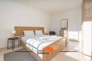 a bedroom with a large bed in a room at #257 Villa Sun & Sea by Home Holidays in Albufeira