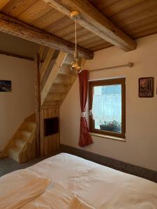 Postel nebo postele na pokoji v ubytování Locanda al Toal