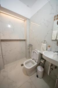 Koupelna v ubytování Aila Apartament
