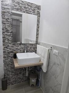 Salle de bains dans l'établissement Vento di Mare