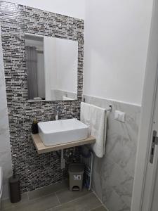 Salle de bains dans l'établissement Vento di Mare