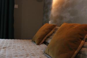 Letto o letti in una camera di Logis Hôtel L'Ayguelade