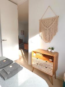 Postel nebo postele na pokoji v ubytování Appartement NoBe Es Pujols proche plage, vue mer