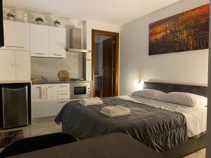 A kitchen or kitchenette at Room Mazzini