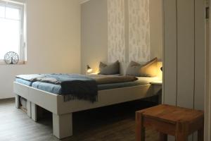 En eller flere senge i et værelse på Weidenhof Xanten