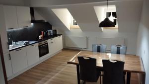 Kuchyň nebo kuchyňský kout v ubytování Apartman Albreit 3