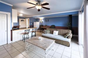 a living room with a couch and a table at Beachwood Condos & Resort in Copalis Beach