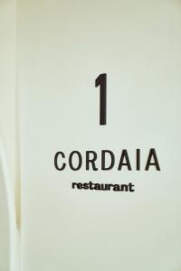 a sign with the name of corralia restaurant at CALEA Boutique Hotel in Bacoli
