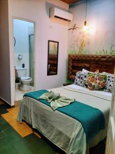 Un pat sau paturi într-o cameră la Hotel Boutique Stay La 10
