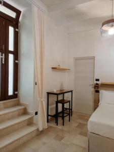 Ένα ή περισσότερα κρεβάτια σε δωμάτιο στο Hasu Rental Rooms