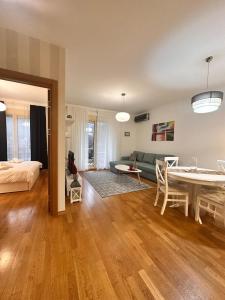 a living room with a couch and a table at Posto Capitano apartment Sasa in Kotor