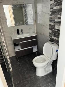 Koupelna v ubytování Apartamento Amoblado + 5 fotografií