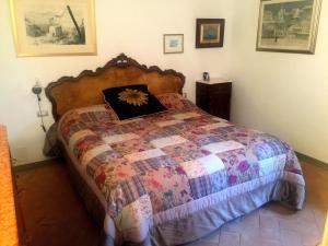 Postel nebo postele na pokoji v ubytování B&B Pino del Capitano